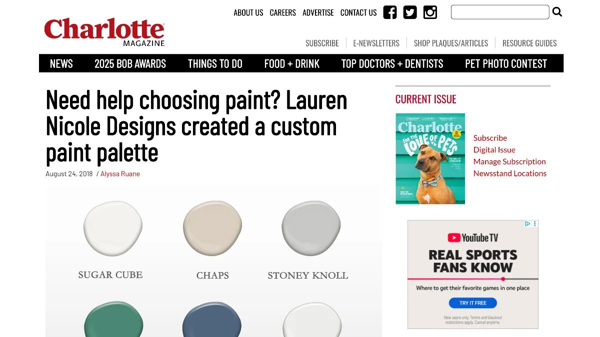 A screenshot of an online article from Charlotte Magazine featuring the headline "Lauren Nicole Designs created a custom paint palette." Below the text, several paint swatches in light and dark colors are visible, labeled with names.