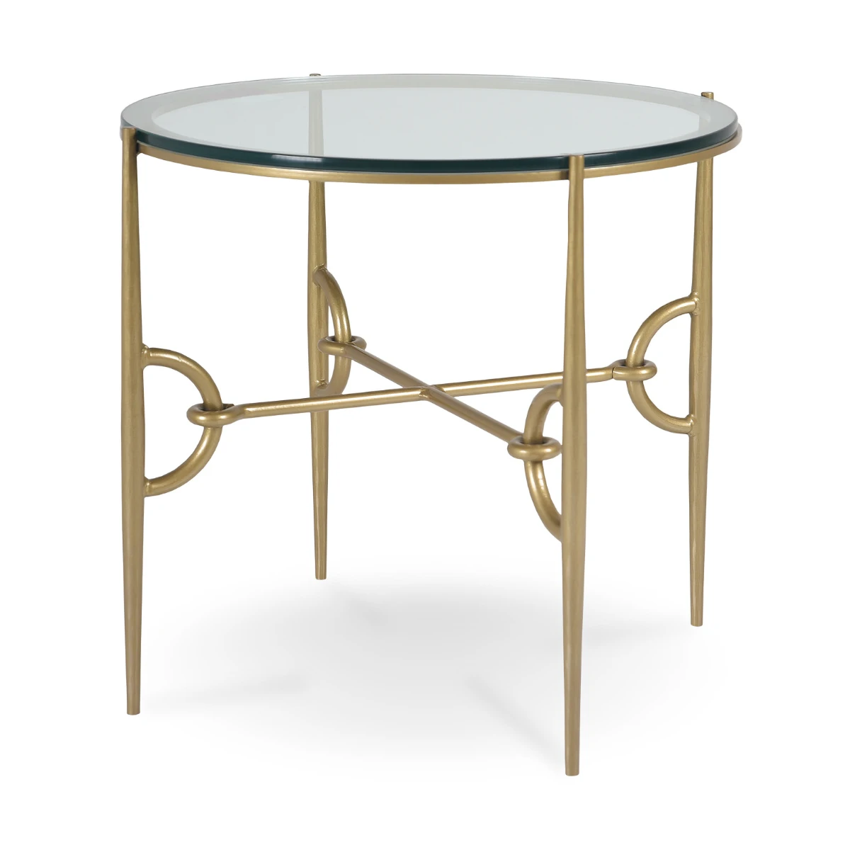 A contemporary round end table featuring a clear glass top and a polished gold metal base. The four tapered legs are connected by decorative knot-like metal rings.
